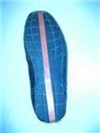 Rubber sole with red stripe
